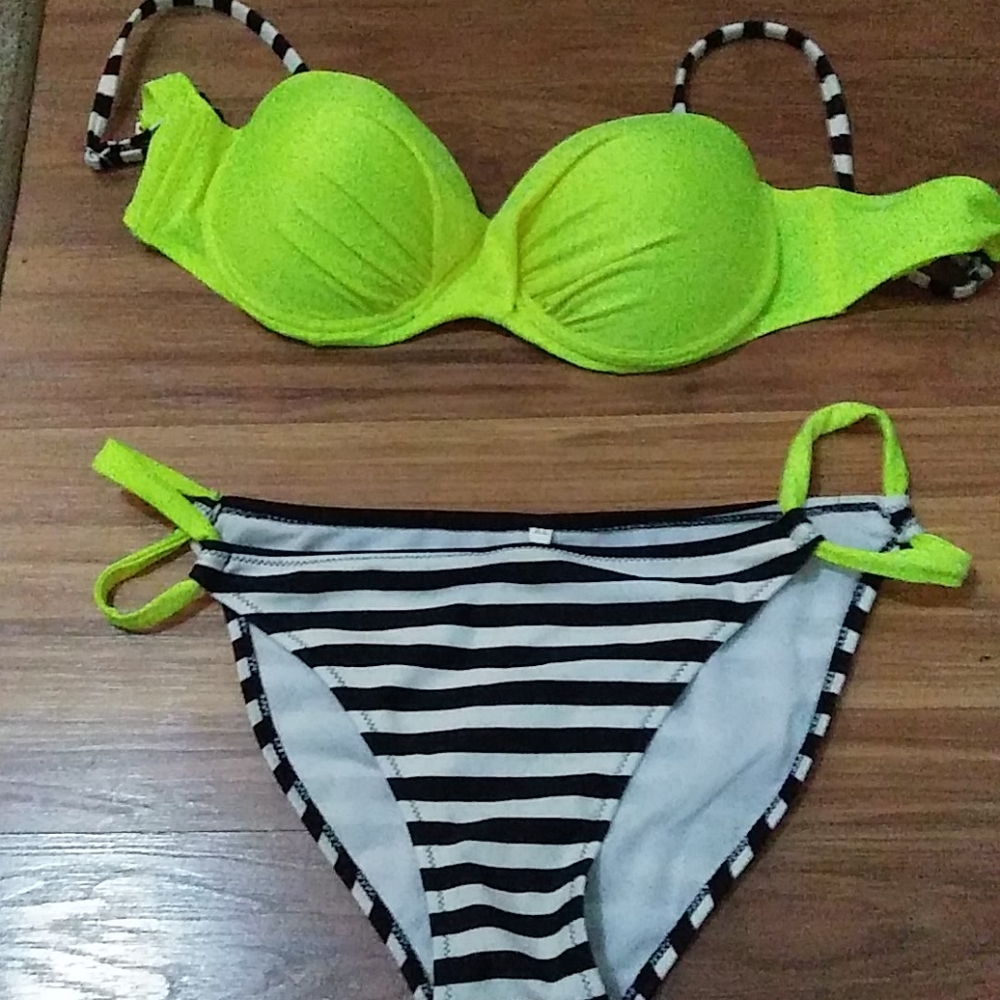 Neon bathing suit. sizeXL.fits like a Lrg.so never wore bc smaller than thought